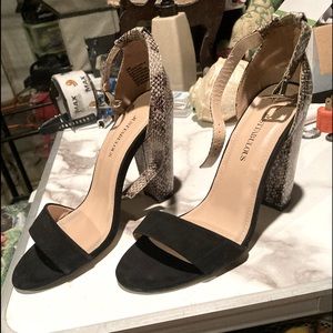 JustFabulous snakeskin open toe heels.